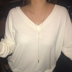 Kendra Scott gold pendant neck